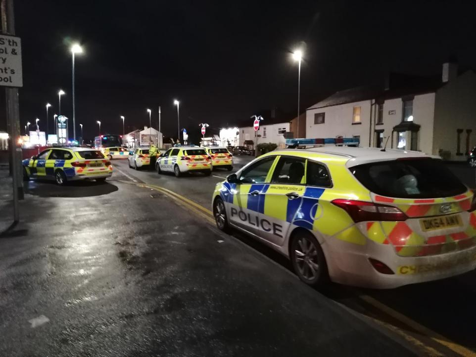 Police on Warrington Road following the fatal collision