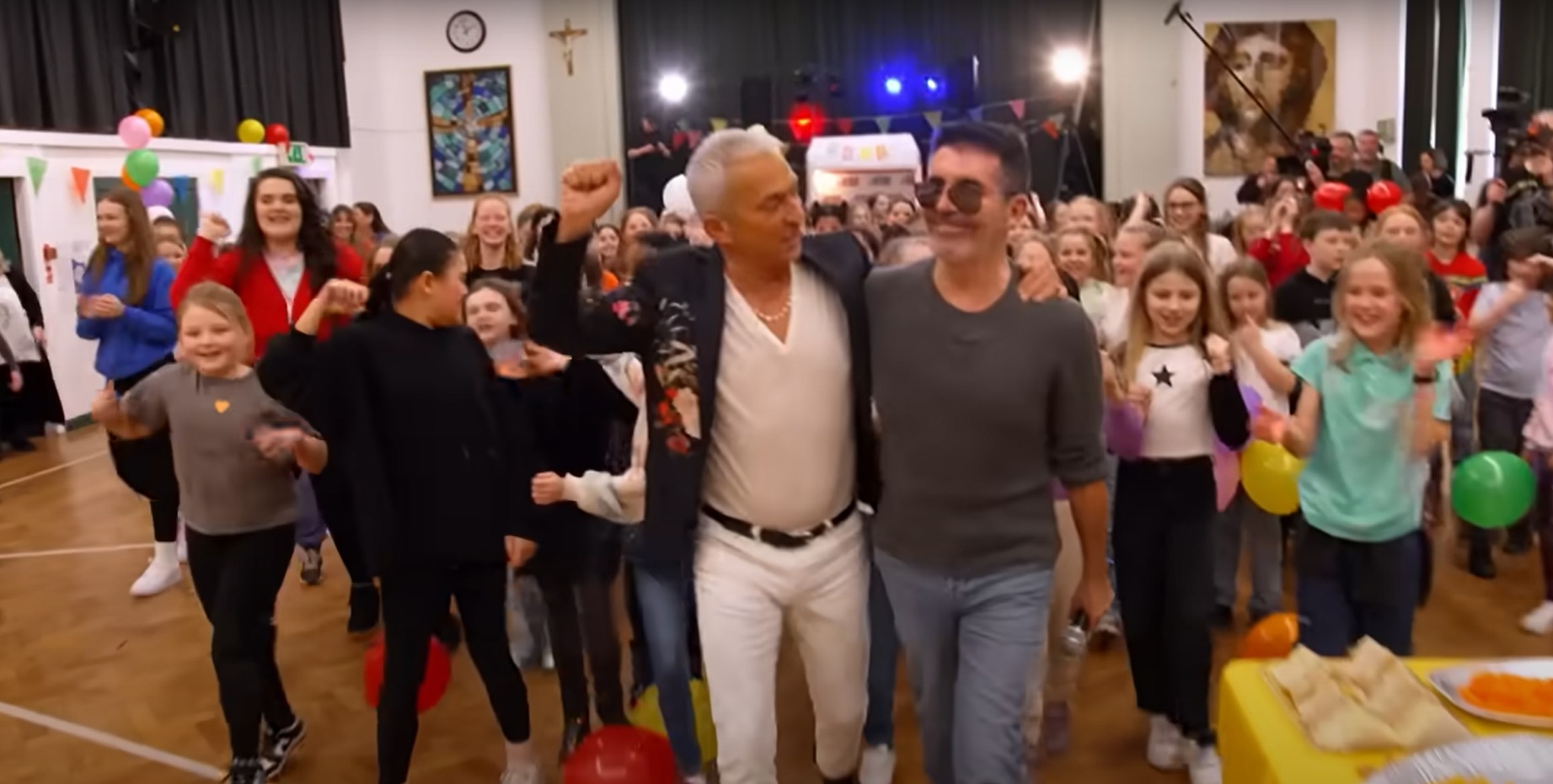 BGT judges Simon Cowell and Bruno Tonioli surprised Amasing children by popping out of a giant box at their end-of-term party. Picture: ITV/Britains Got Talent.