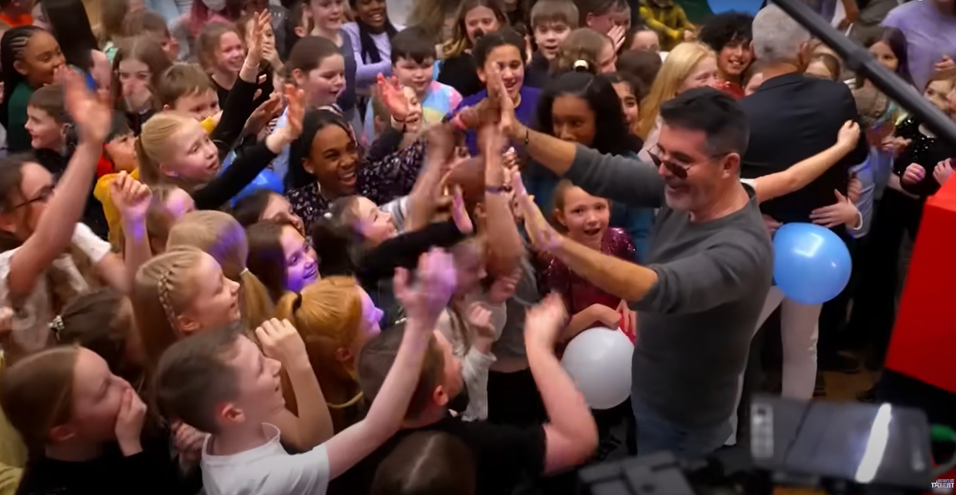 BGT judges Simon Cowell and Bruno Tonioli surprised Amasing children by popping out of a giant box at their end-of-term party. Picture: ITV/Britains Got Talent.