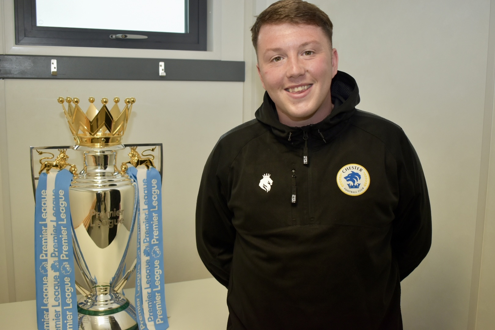 Players and families enjoyed their chance to be pictured with the Premier League trophy and the UEFA Womens Euro trophy at Chester FC Girls Emerging Talent Centre.