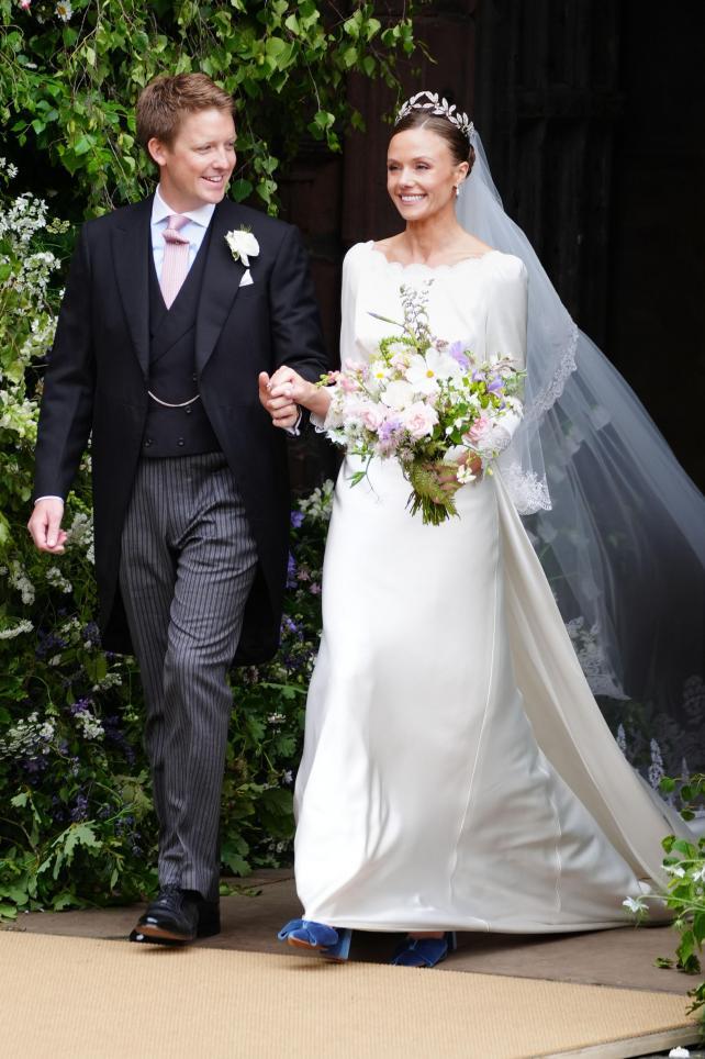 The Duke and Duchess of Westminster step out of Chester Cathedral following their wedding. Picture: PA.