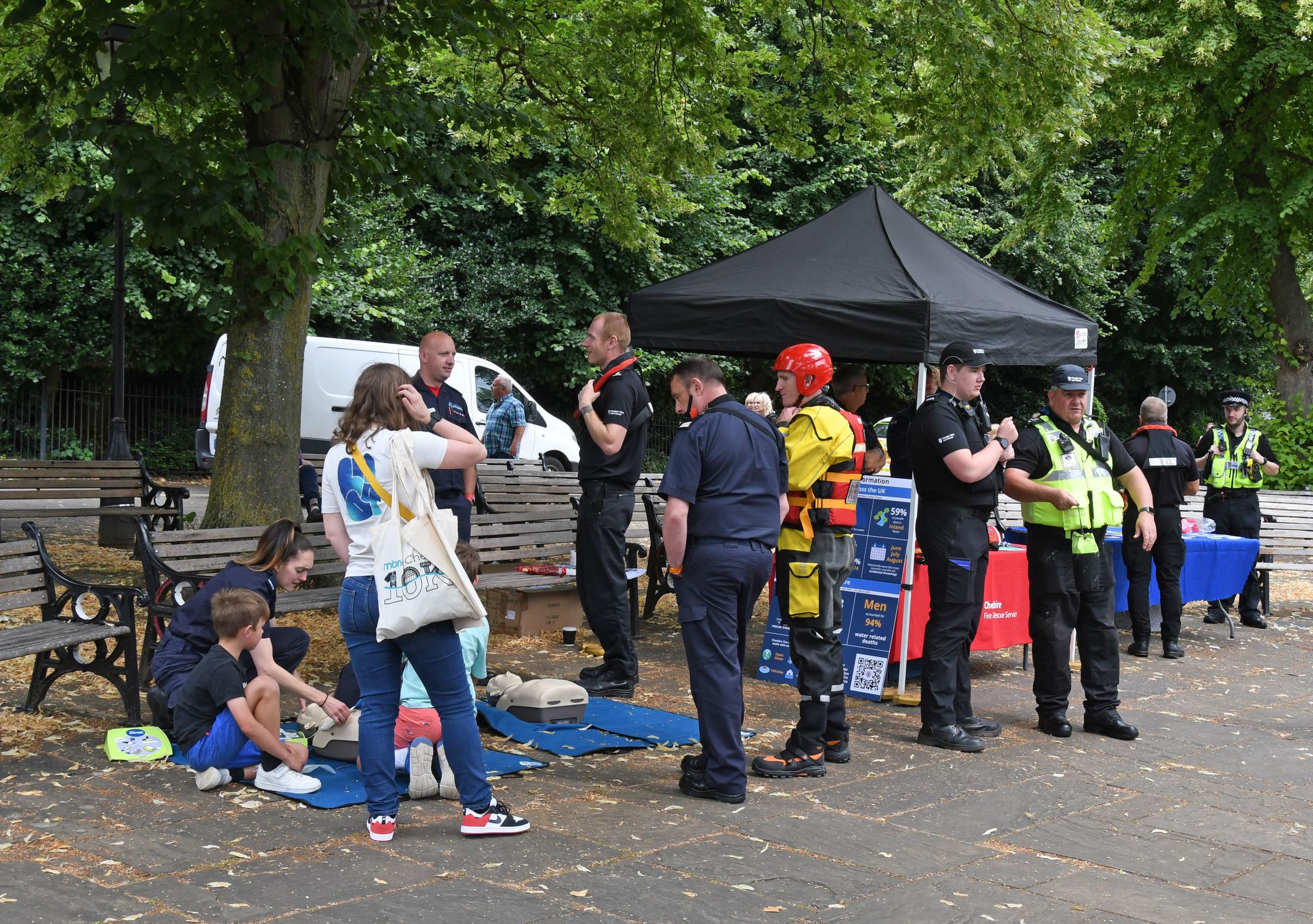 Visitors learn about lifesaving techniques at the riverside.