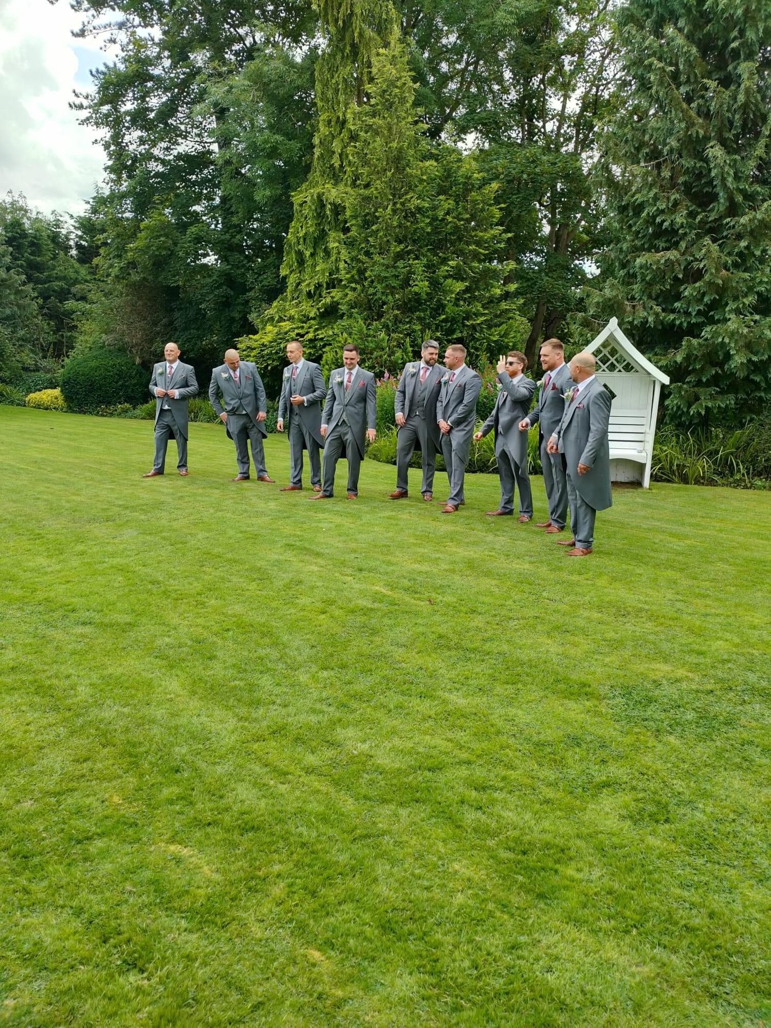 The groomsmen.