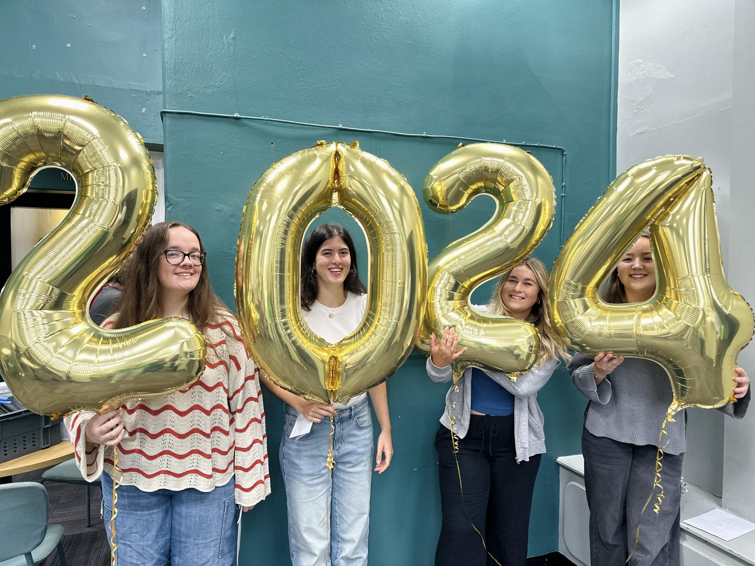 Celebrations at Queens Park High School as students collect their A-level results.