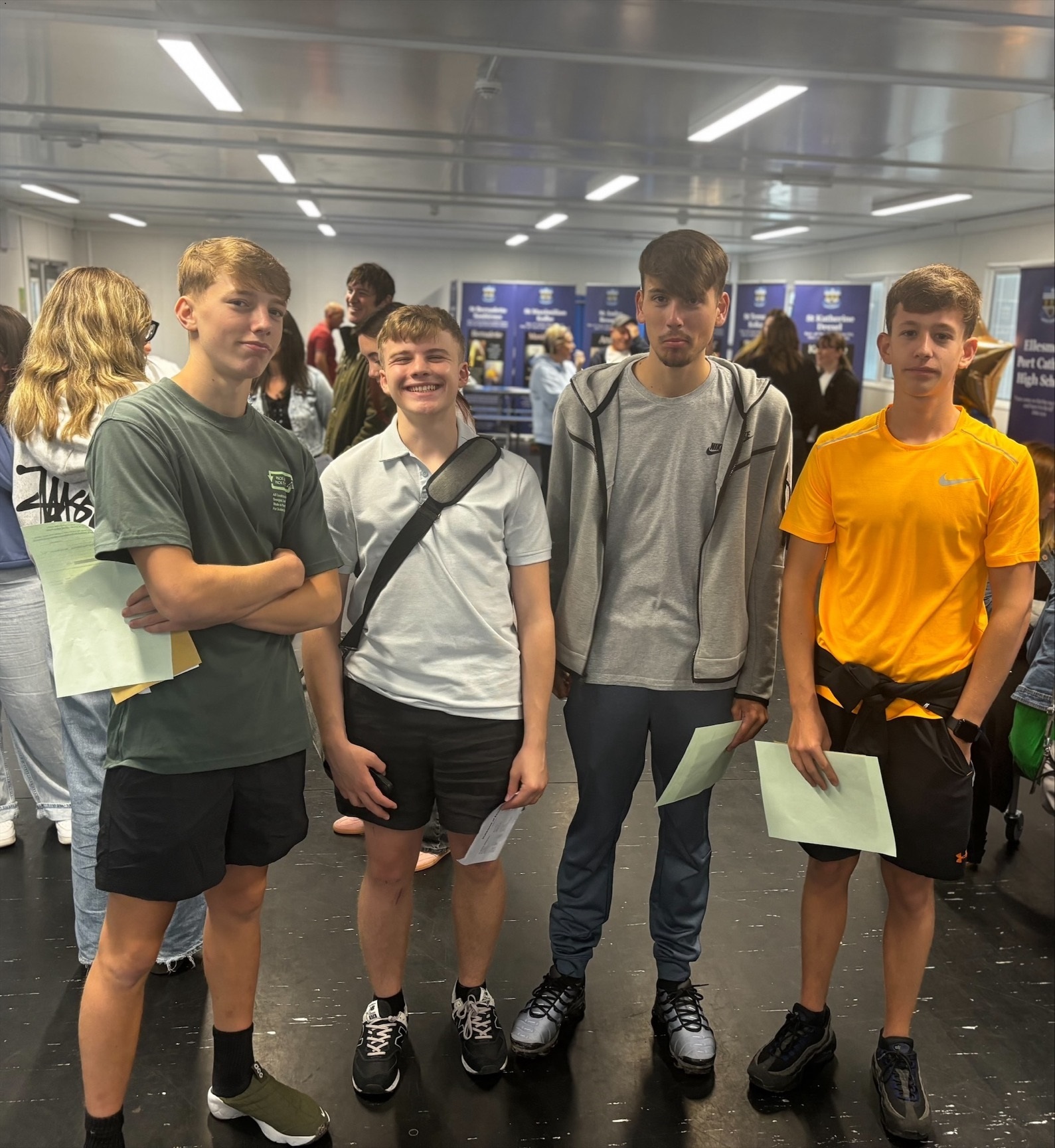 Ellesmere Port Catholic High School students celebrate their A-level results.