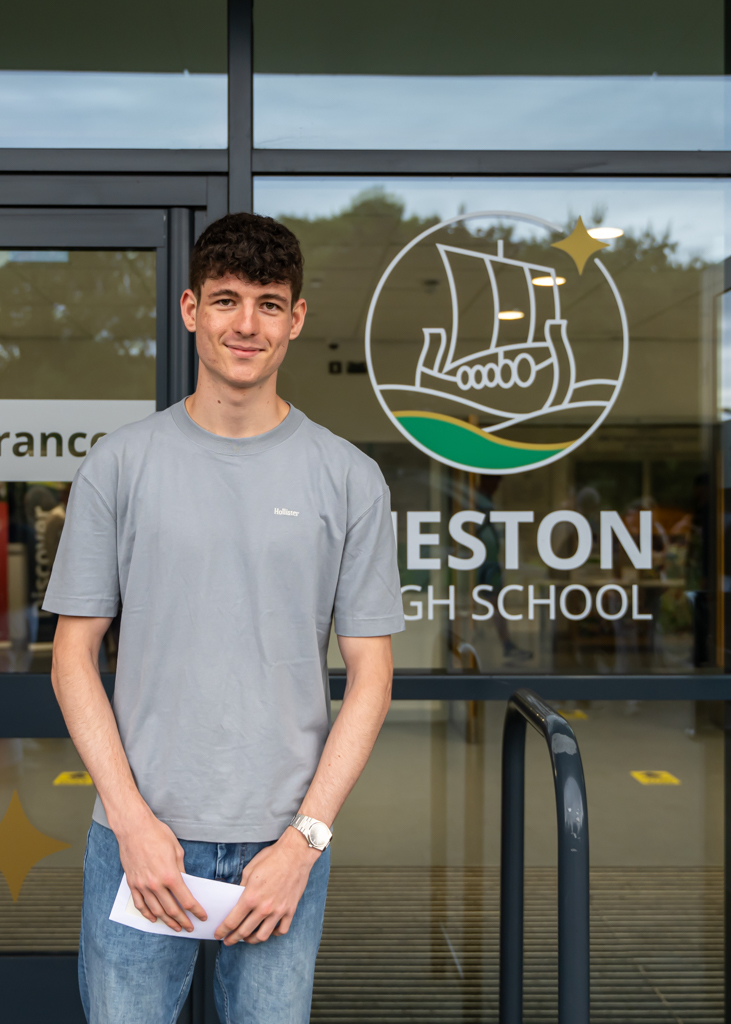 Neston High School students celebrate their A-level results.