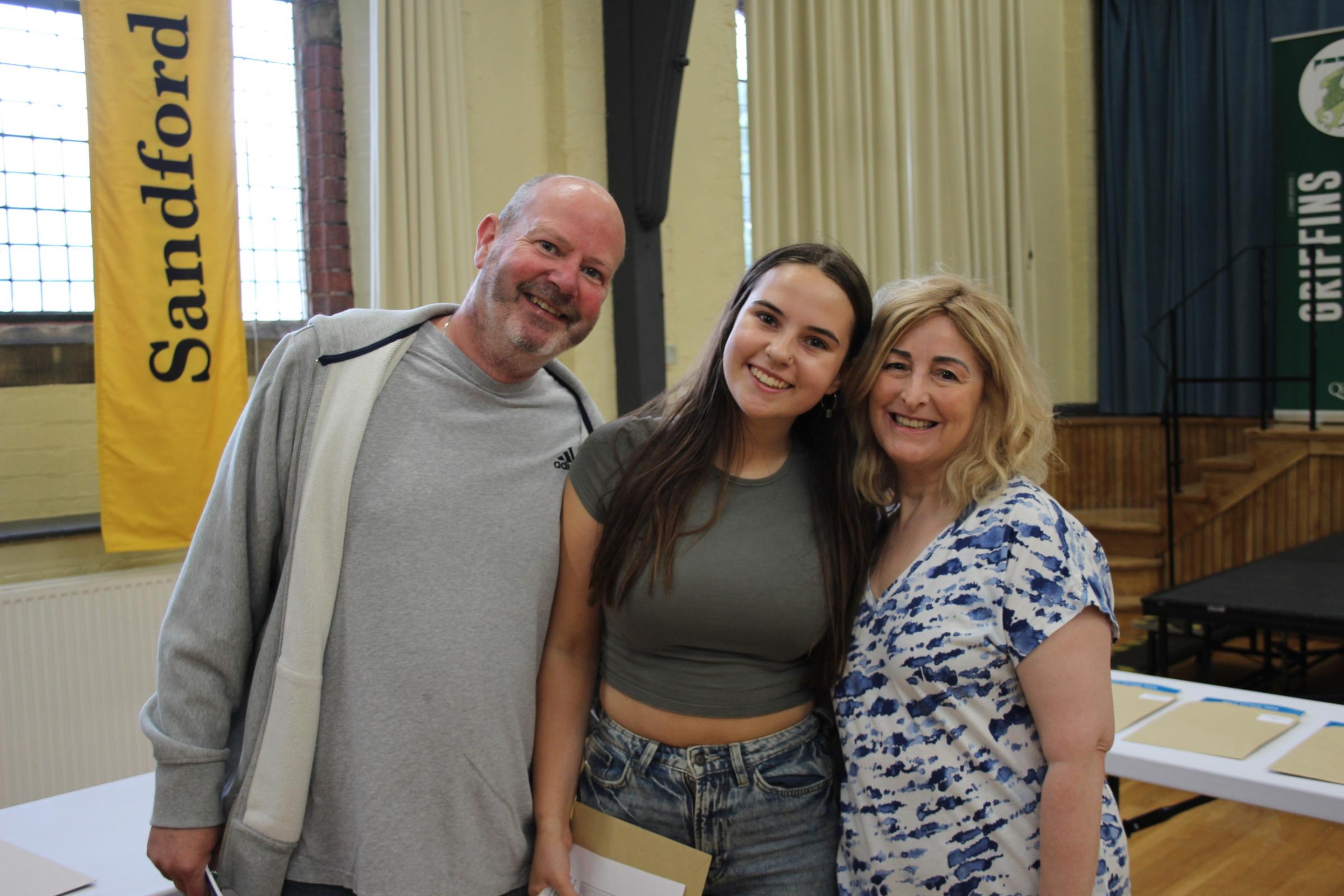 Natalie James with her proud parents.