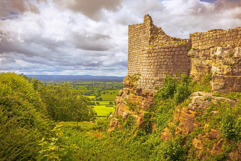 Beeston Castle sits atop a rocky crag high above the Cheshire Plain.