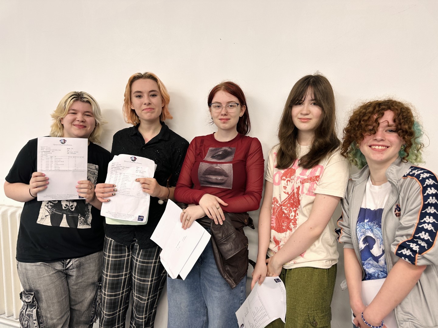 Queens Park High School students celebrating their GCSE results.