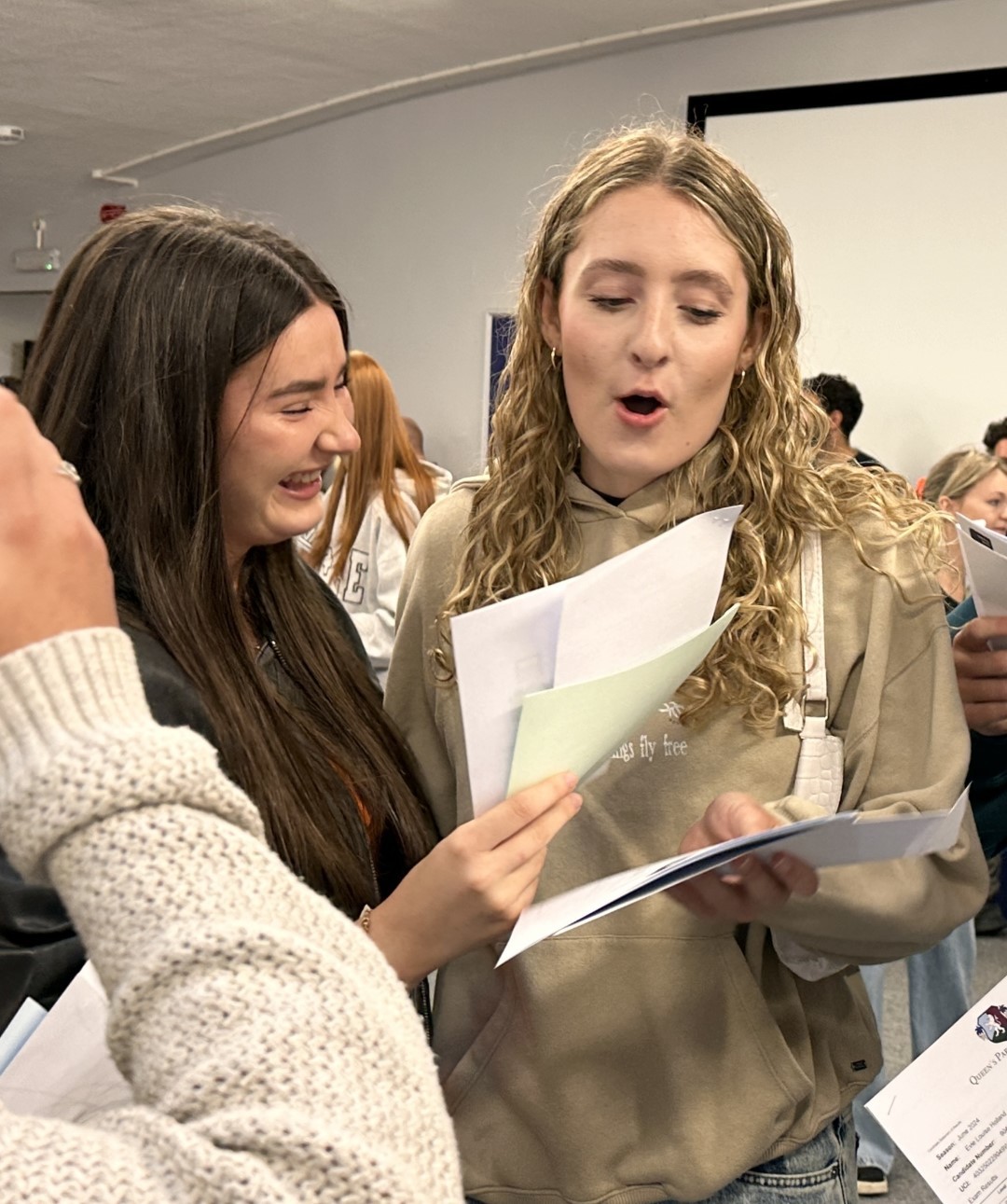 Queens Park High School students celebrating their GCSE results.