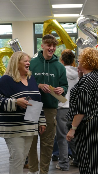 The Bishops Blue Coat CE High School students celebrate.