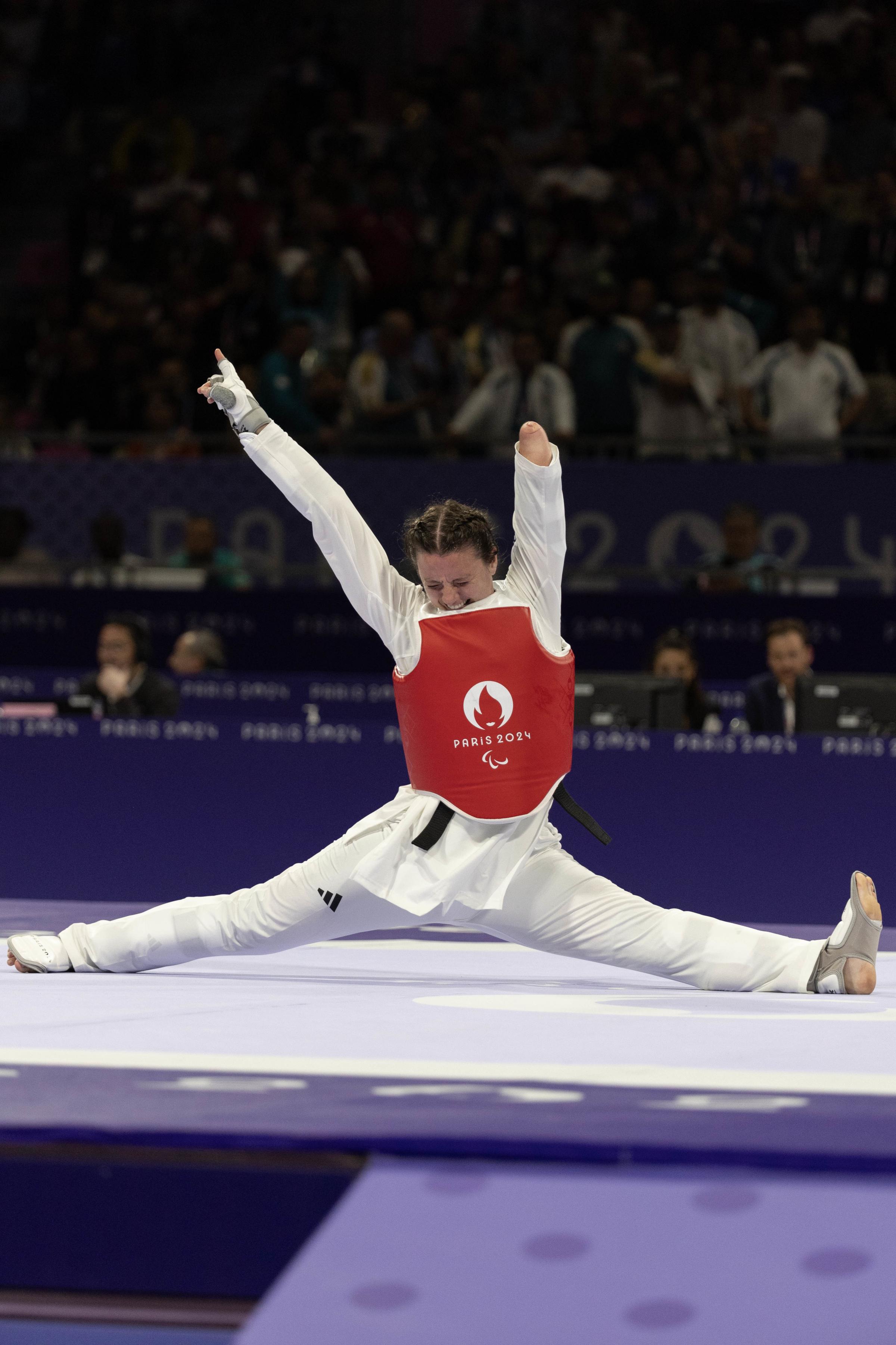 Great Britains Amy Truesdale celebrates winning gold in the K44 +65kg W - Women at the Grand Palais. Picture: PA.