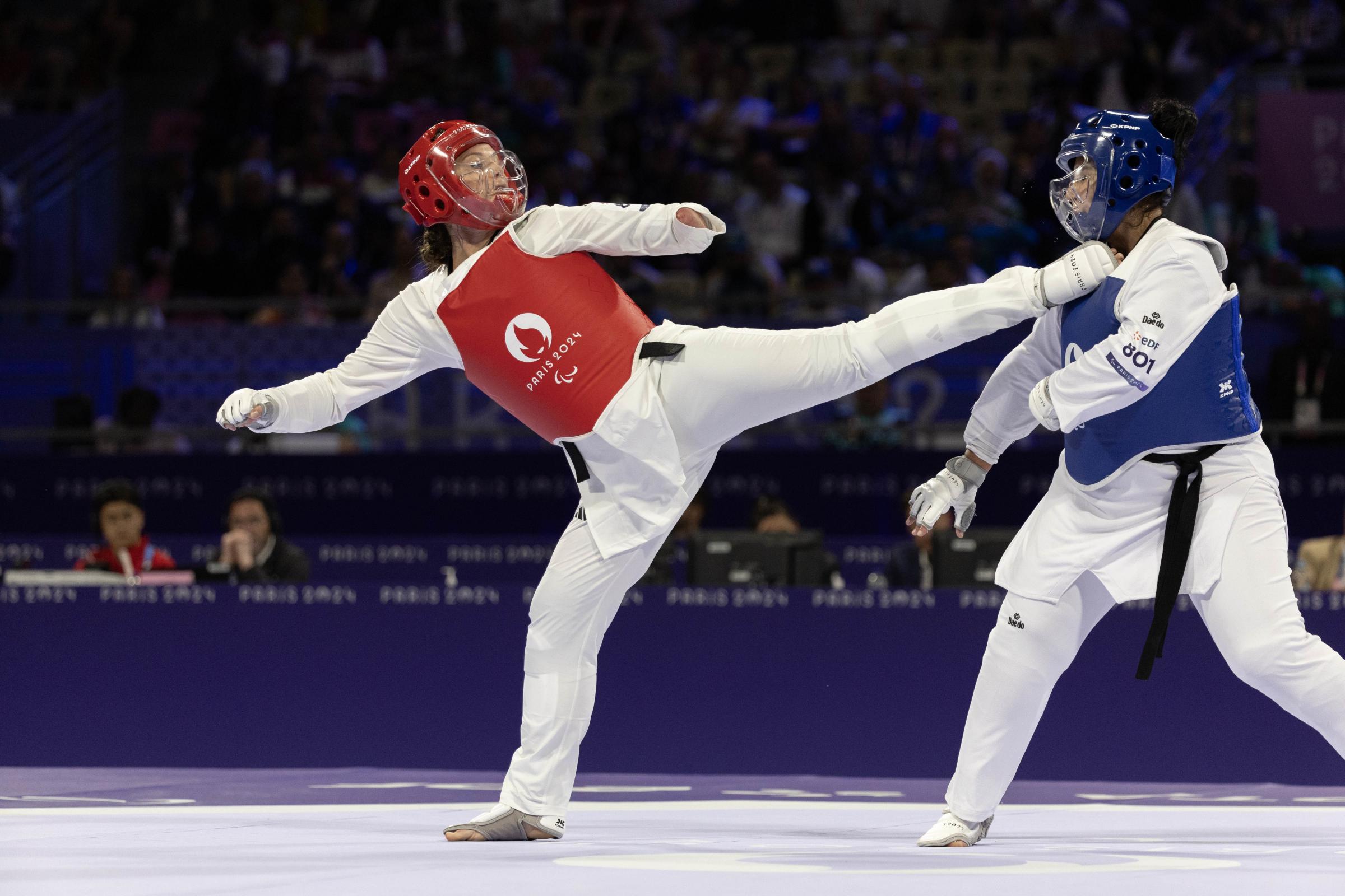 Great Britains Amy Truesdale celebrates winning gold in the K44 +65kg W - Women at the Grand Palais. Picture: PA.