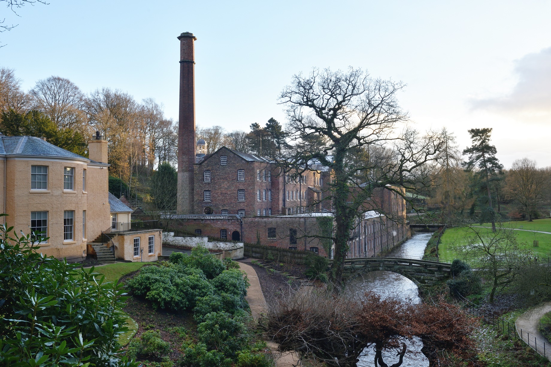 Quarry Bank House and the mill in winter at Quarry Bank Mill, Cheshire.